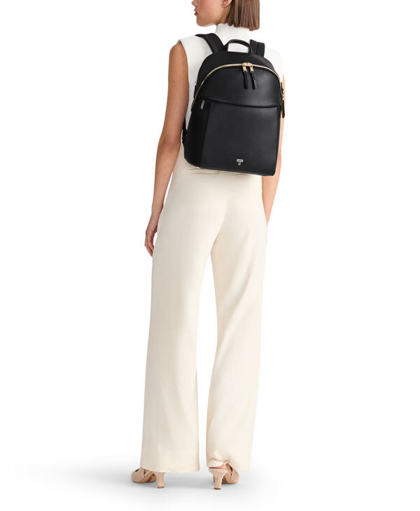 Tumi black and gold backpack on sale