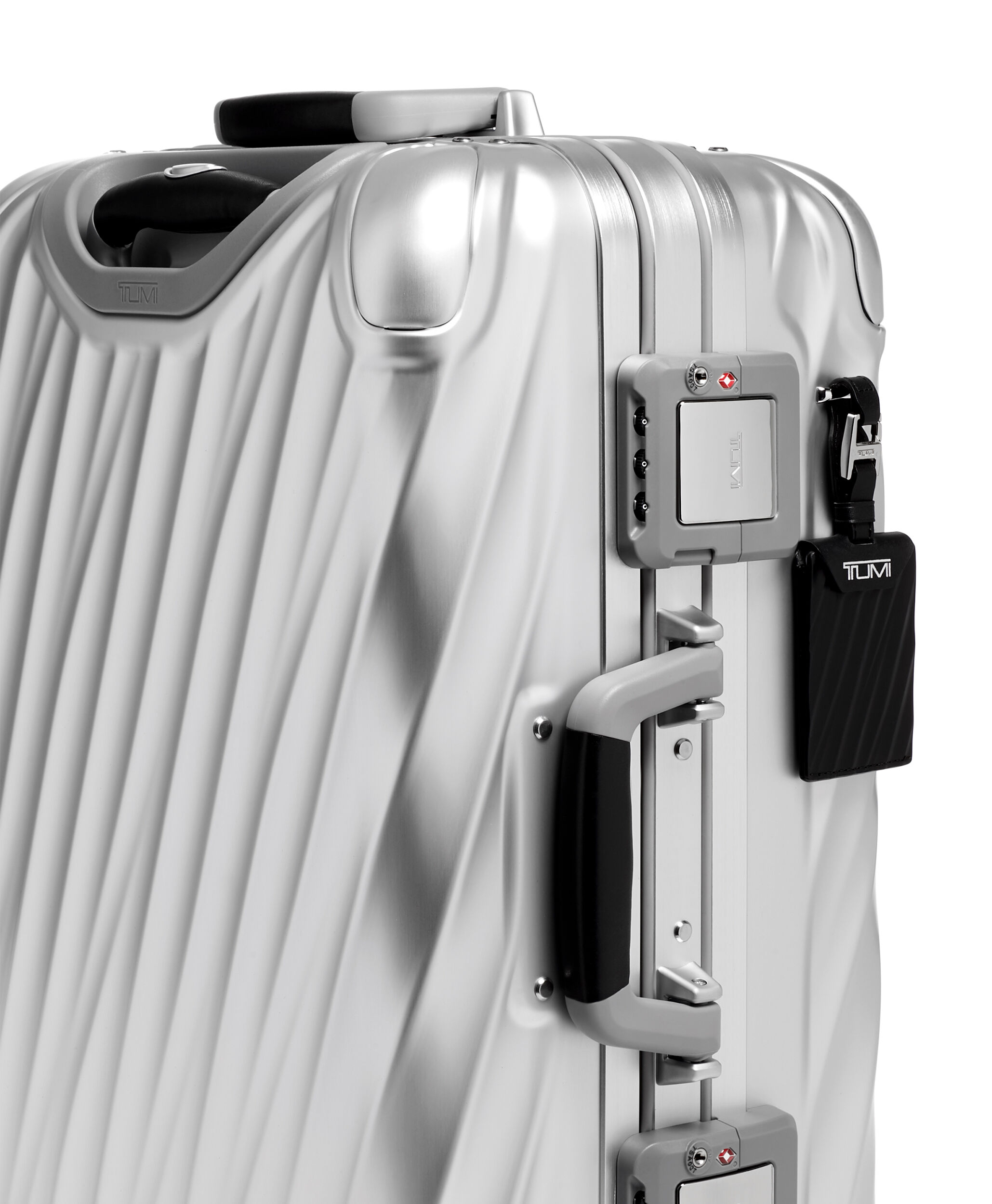 Tumi silver suitcase top