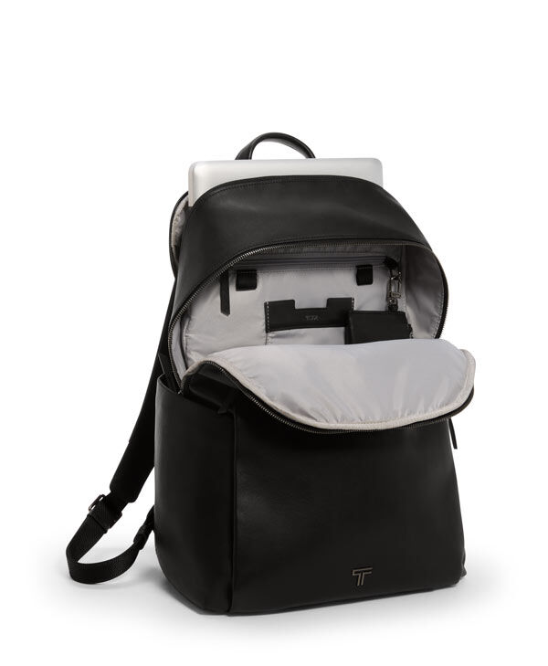 Tumi black and gold backpack on sale