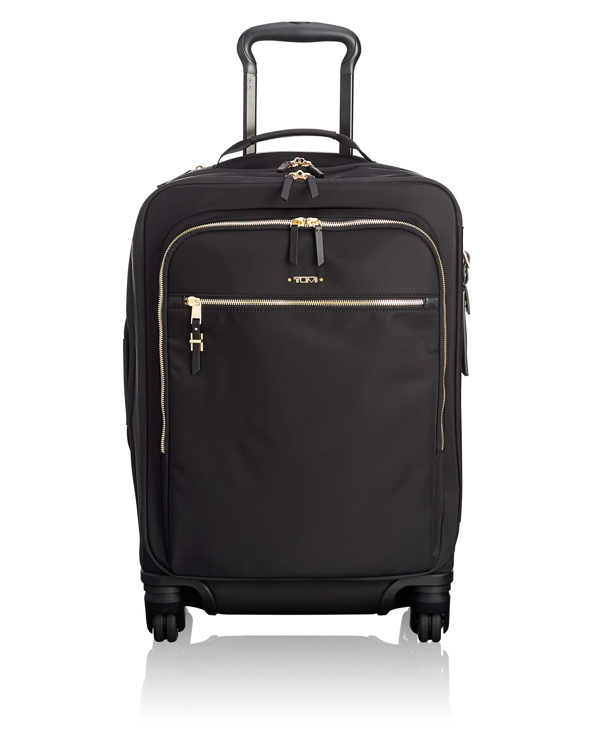 Tumi black and gold luggage Clearance